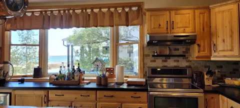 Kitchen - 14711 Hemlock Ln, Ocqueoc, MI 49759 photo 2 of 12