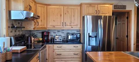 Kitchen - 14711 Hemlock Ln, Ocqueoc, MI 49759 photo 7 of 12
