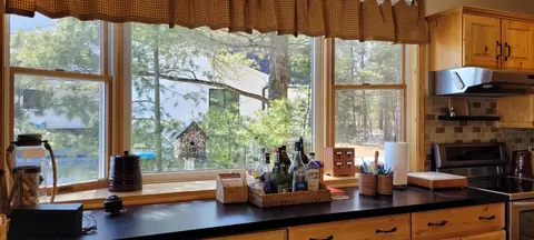 Kitchen - 14711 Hemlock Ln, Ocqueoc, MI 49759 photo 6 of 12