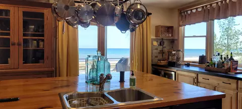 Kitchen - 14711 Hemlock Ln, Ocqueoc, MI 49759 photo 3 of 12