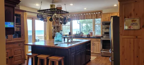 Kitchen - 14711 Hemlock Ln, Ocqueoc, MI 49759 photo 12 of 12