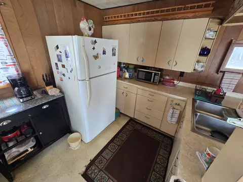 Kitchen - 201 Nolan St, Mio, MI 48647 photo 5 of 6
