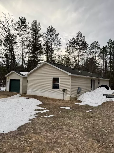 445 Darwin Ave #NE, Kalkaska, MI 49646