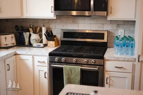 Kitchen - 3211 Jenson St, Lewiston, MI 49756 photo 6 of 12