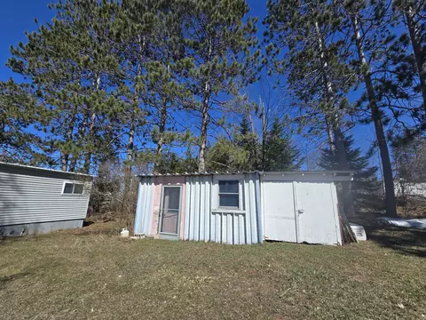 Exterior - 2051 Stutesman Dr, Fairview, MI 48621 photo 3 of 17