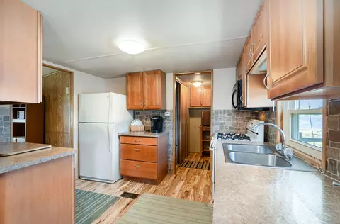 Kitchen - 1524 E Lake Point Dr, Gladwin, MI 48624 photo 3 of 3
