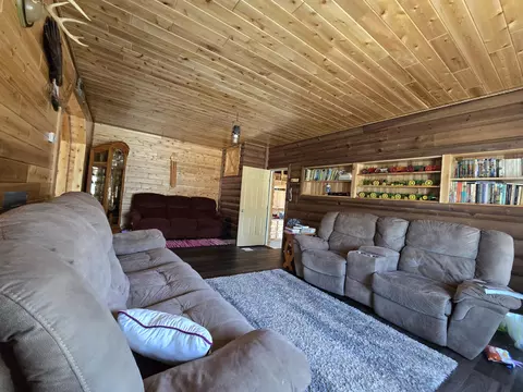 Living - 1300 N Perry Creek Rd, Fairview, MI 48621 photo 4 of 4