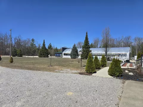 Exterior - 1300 N Perry Creek Rd, Fairview, MI 48621 photo 5 of 53