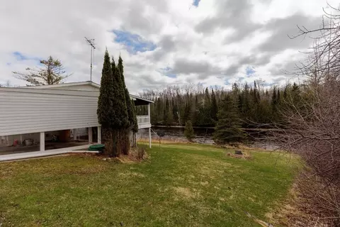Exterior - 4849 Betterly Dr, Cheboygan, MI 49721 photo 5 of 14