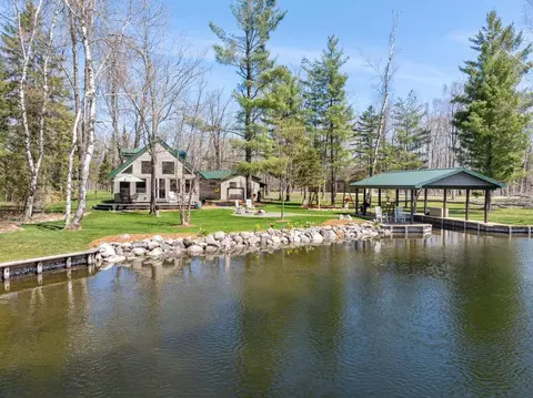 8282 Devils Elbow Dr, Brutus, MI 49716