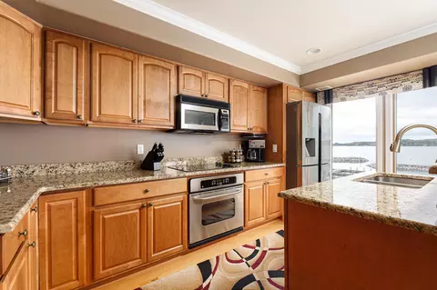 Kitchen - 708 N Dockside Cir # E-5, Suttons Bay, MI 49682 photo 2 of 8