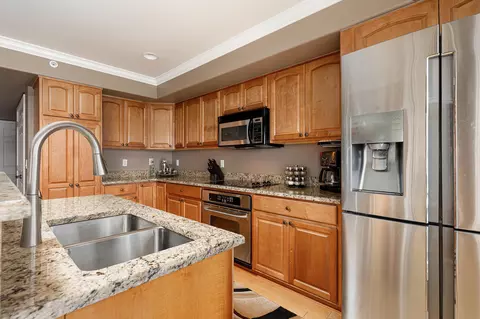 Kitchen - 708 N Dockside Cir # E-5, Suttons Bay, MI 49682 photo 5 of 8