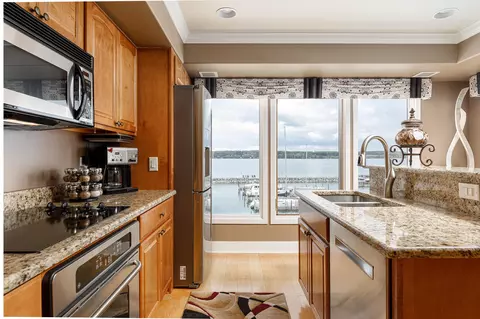 Kitchen - 708 N Dockside Cir # E-5, Suttons Bay, MI 49682 photo 3 of 8