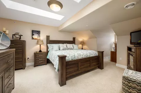 Bedroom - 708 N Dockside Cir # E-5, Suttons Bay, MI 49682 photo 2 of 6