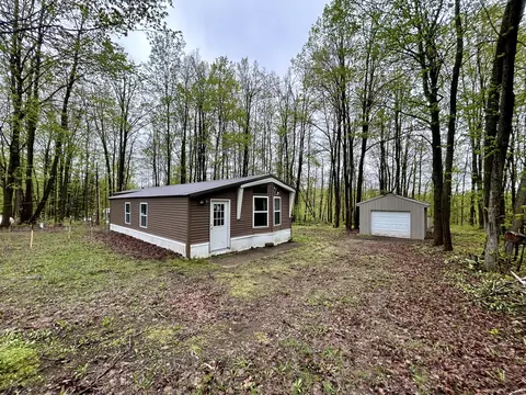 8448 Heatherton Cir, Mancelona, MI 49659