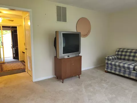 Living - 3022 Sumac Trl, Lupton, MI 48635 photo 2 of 3