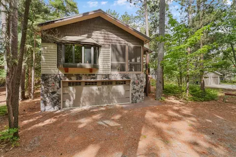 Exterior - 117 Timber Trl, Roscommon, MI 48653 photo 9 of 10