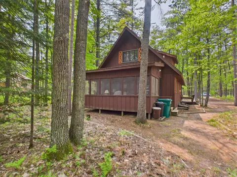 Exterior - 10985 Sanctuary Dr, Frederic, MI 49733 photo 2 of 9