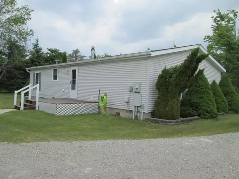 Exterior - 5189 Pinecrest Dr, Lewiston, MI 49756 photo 7 of 11