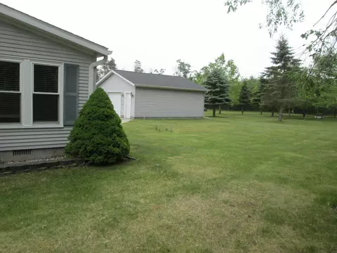Exterior - 5189 Pinecrest Dr, Lewiston, MI 49756 photo 9 of 11