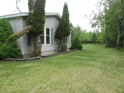 Exterior - 5189 Pinecrest Dr, Lewiston, MI 49756 photo 5 of 11