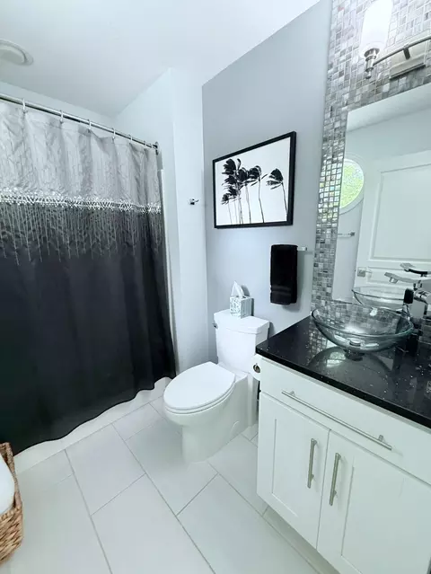 Bath - 129 Ethel Dr, Roscommon, MI 48653 photo 1 of 8