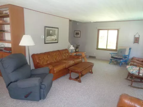 Living - 205 Jackson Blvd, Roscommon, MI 48653 photo 1 of 2