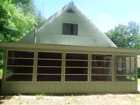 Exterior - 205 Jackson Blvd, Roscommon, MI 48653 photo 4 of 6
