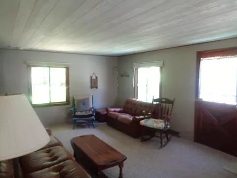Living - 205 Jackson Blvd, Roscommon, MI 48653 photo 2 of 2