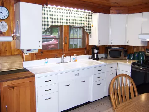 Kitchen - 409 Marvin Rd, Roscommon, MI 48653 photo 3 of 5
