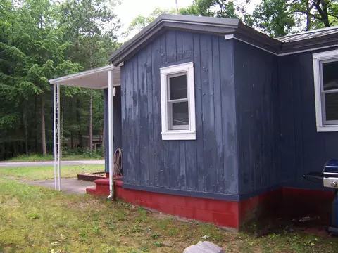 Exterior - 409 Marvin Rd, Roscommon, MI 48653 photo 3 of 9