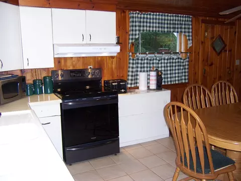 Kitchen - 409 Marvin Rd, Roscommon, MI 48653 photo 5 of 5