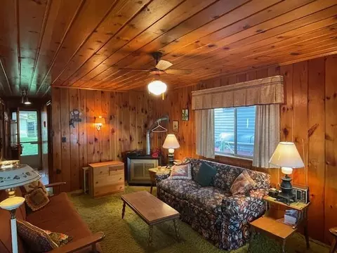 Living - 423 Clare Blvd, Roscommon, MI 48653 photo 1 of 3