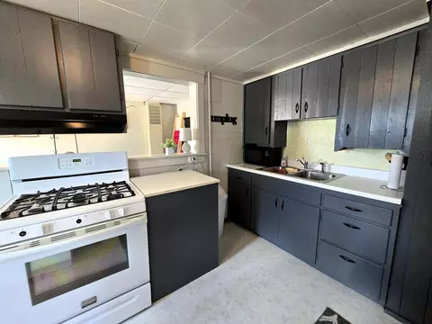 Kitchen - 7931 Mill St, Vanderbilt, MI 49795 photo 4 of 6