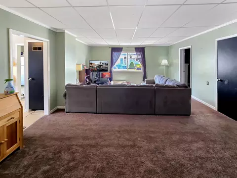 Living - 7931 Mill St, Vanderbilt, MI 49795 photo 1 of 2