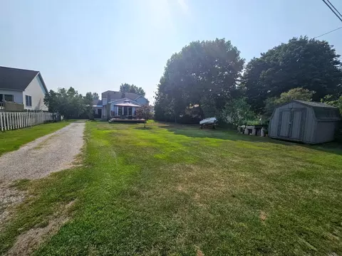 Exterior - 113 E Wisner St, Alpena, MI 49707 photo 7 of 12