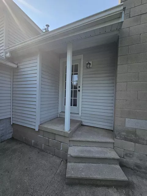 Exterior - 113 E Wisner St, Alpena, MI 49707 photo 8 of 12