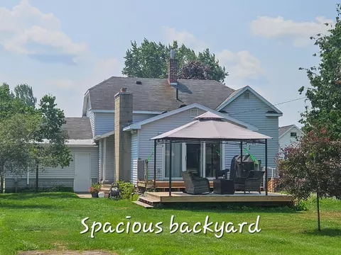 Exterior - 113 E Wisner St, Alpena, MI 49707 photo 4 of 12
