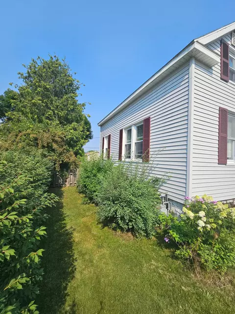 Exterior - 113 E Wisner St, Alpena, MI 49707 photo 3 of 12