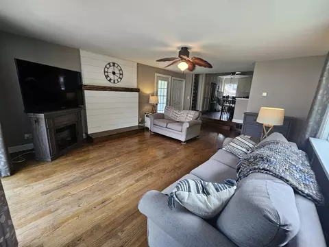 Living - 113 E Wisner St, Alpena, MI 49707 photo 2 of 2