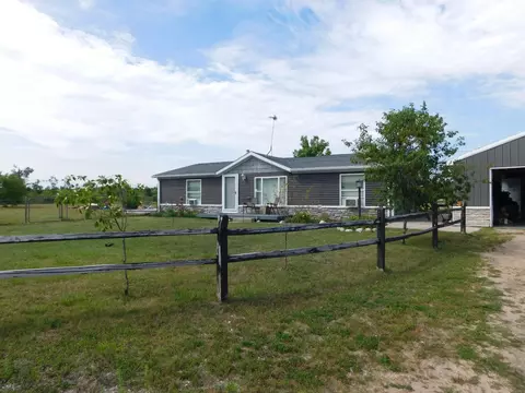 Exterior - 7286 Smith Trl, Grayling, MI 49738 photo 2 of 13