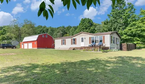 9792 Deal Rd, Williamsburg, MI 49690