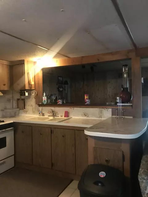 Kitchen - 2435 Deer Ln, Luzerne, MI 48636 photo 2 of 3
