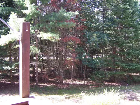 Exterior - 308 Ausable River Trl, Roscommon, MI 48653 photo 12 of 15