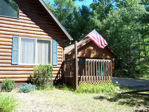 Exterior - 308 Ausable River Trl, Roscommon, MI 48653 photo 8 of 15