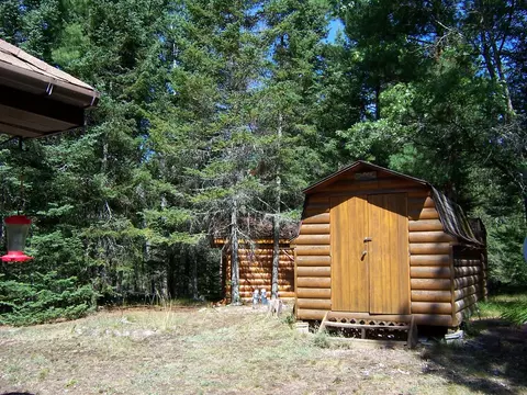 Exterior - 308 Ausable River Trl, Roscommon, MI 48653 photo 7 of 15