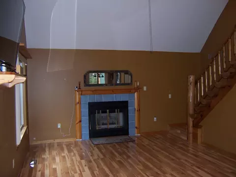 Living - 308 Ausable River Trl, Roscommon, MI 48653 photo 1 of 1