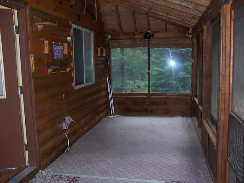 Exterior - 308 Ausable River Trl, Roscommon, MI 48653 photo 5 of 15