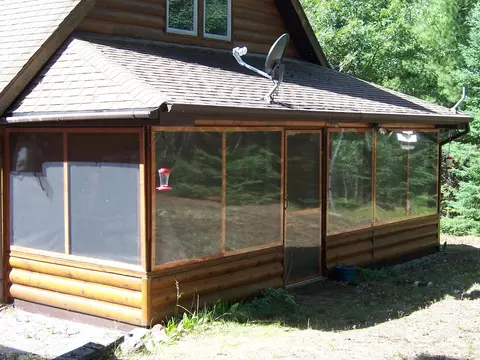 Exterior - 308 Ausable River Trl, Roscommon, MI 48653 photo 3 of 15