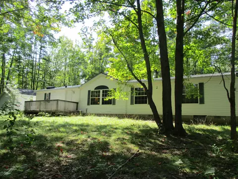 Exterior - 5016 Laran Ln, Frederic, MI 49733 photo 6 of 13